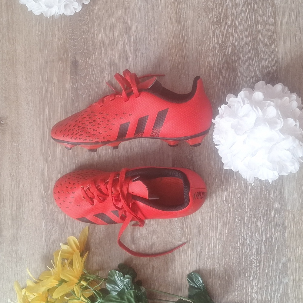 Red Addidas soccer cleat for boys size 1.5